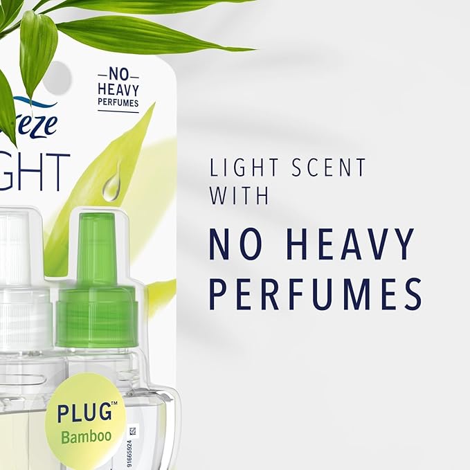 Febreze Plug with Fade Defy Technology Air Freshener - New Limited Edition - (3) of 0.87 fl oz Refills (Bamboo Bambou)