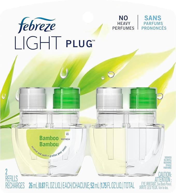 Febreze Plug with Fade Defy Technology Air Freshener (2) of 0.87 fl oz Refills (Bamboo Bambou)