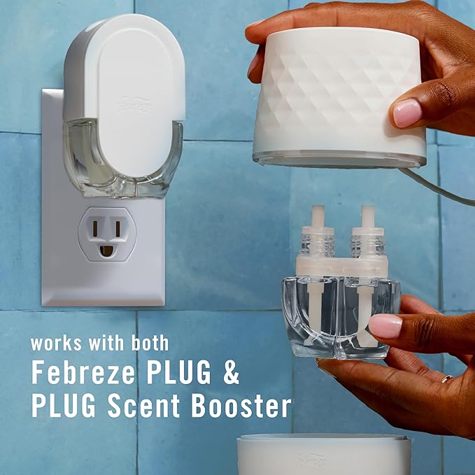 Febreze Plug Scent Booster Starter Kit Oil Diffuser Air Freshener Plug in Continuous Scent 2 Devices + 2 Baked Cinnamon Apple Refill