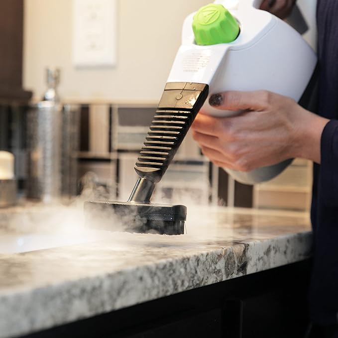 Steamfast SF-210 Handheld Steam Cleaner 6 Accessories Included 12-Foot Power Cord Chemical-Free Steam Heats Up in 3 Minutes 6-Ounce Water Tank Powerful Steam Removes Dirt Grime Grease and More