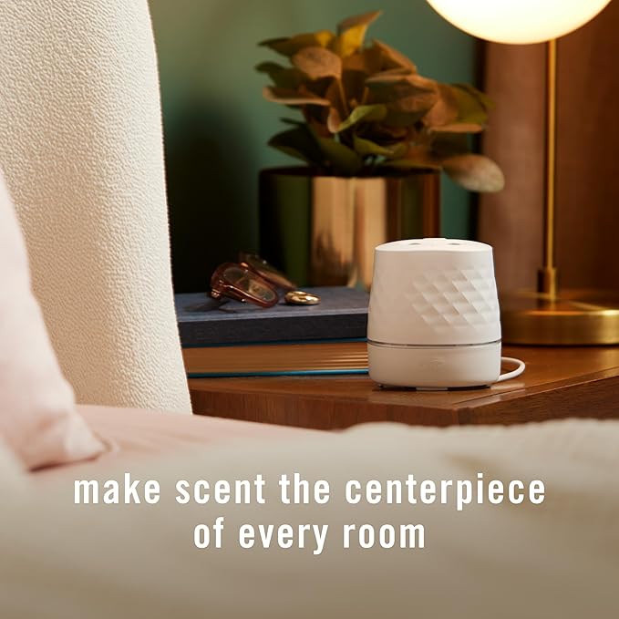 Febreze Plug Scent Booster Starter Kit Oil Diffuser Air Freshener Plug in Continuous Scent 2 Devices + 2 Baked Cinnamon Apple Refill